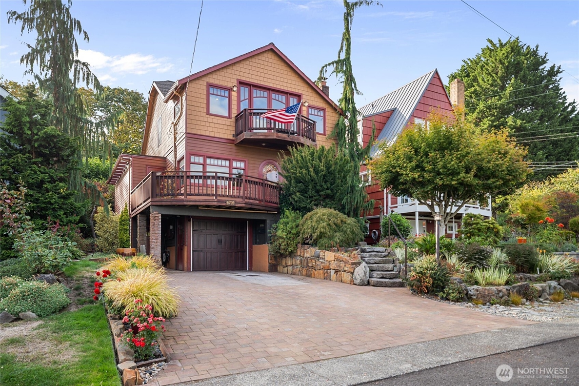 Western Washington home with landscaped front yard and driveway, representing a property being sold remotely by an out-of-state homeowner.