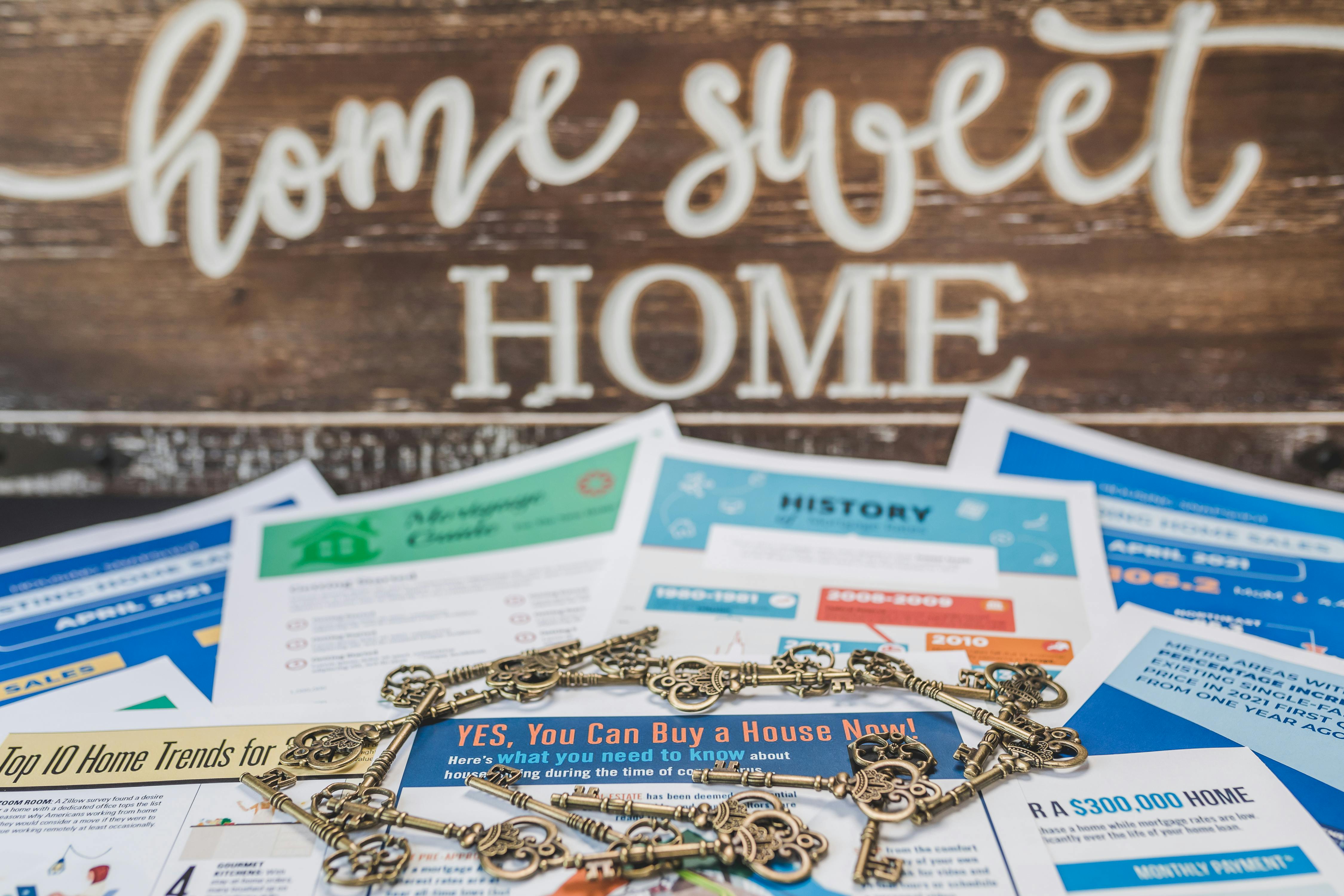 Keys and brochures for first time home buyer