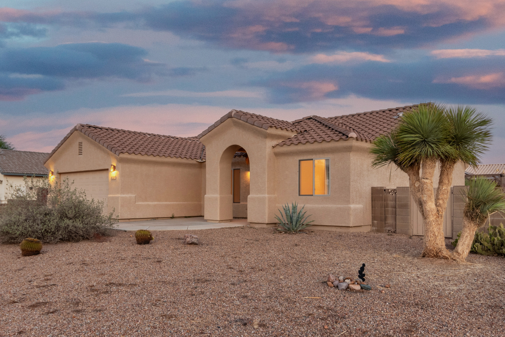 Charming Southwestern-style home with RV access and golf course proximity hits the market in Arizona City header image.