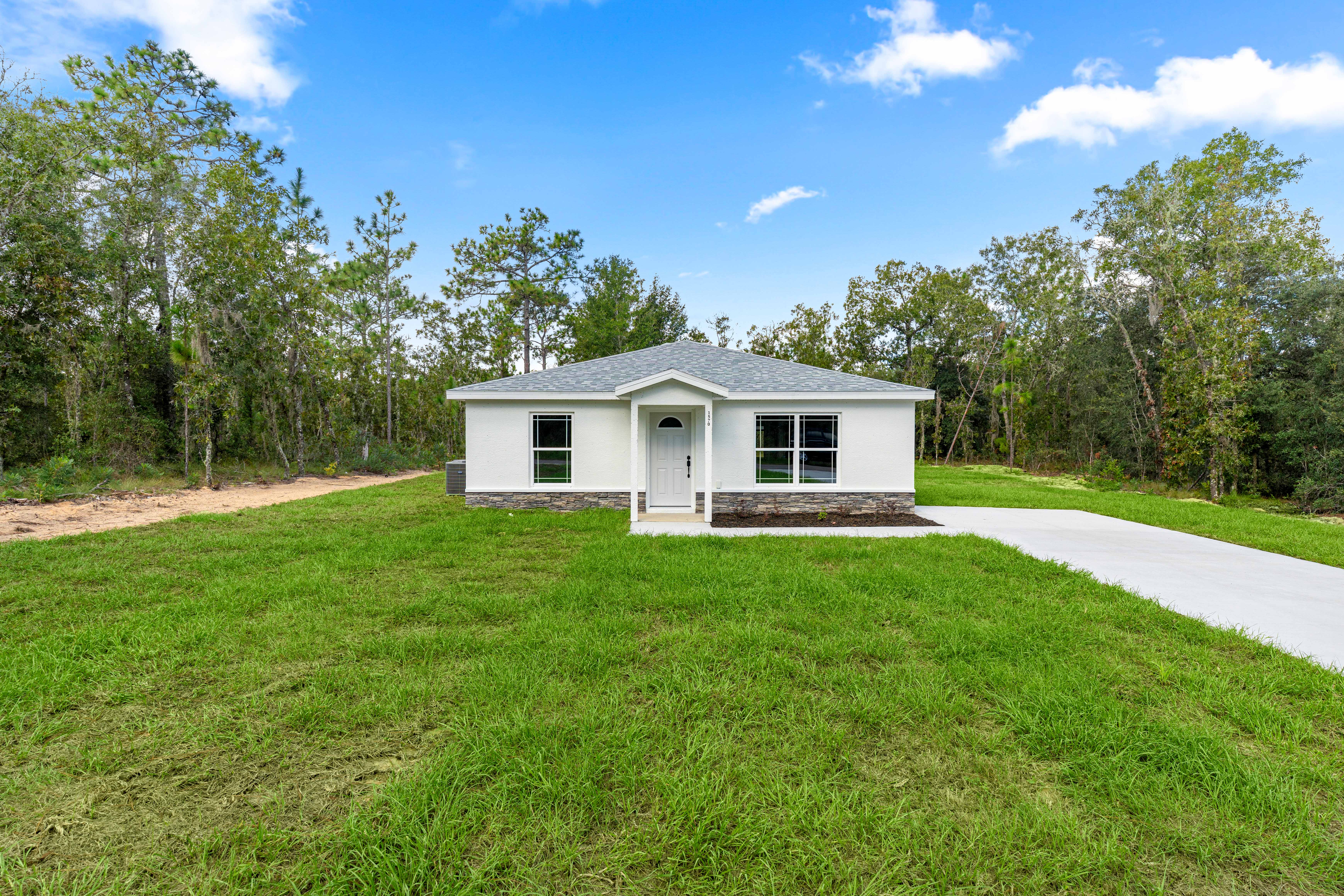 🌿 Brand-New, Affordable & Surrounded by Trees — Your Williston Highlands Home Awaits header image.