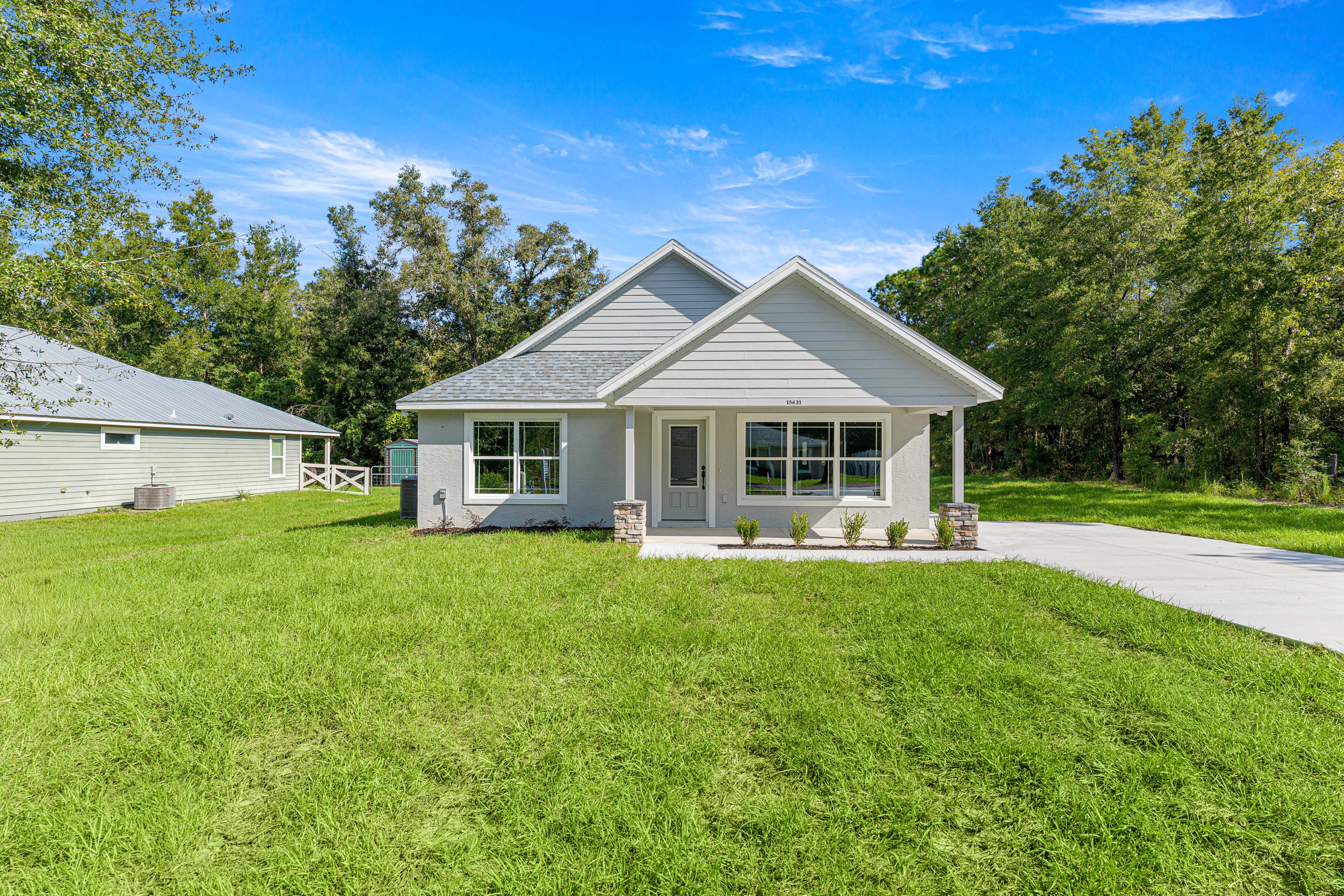 Brand-new 2026 modern farmhouse home at 15631 NE 14th Pl in Williston FL