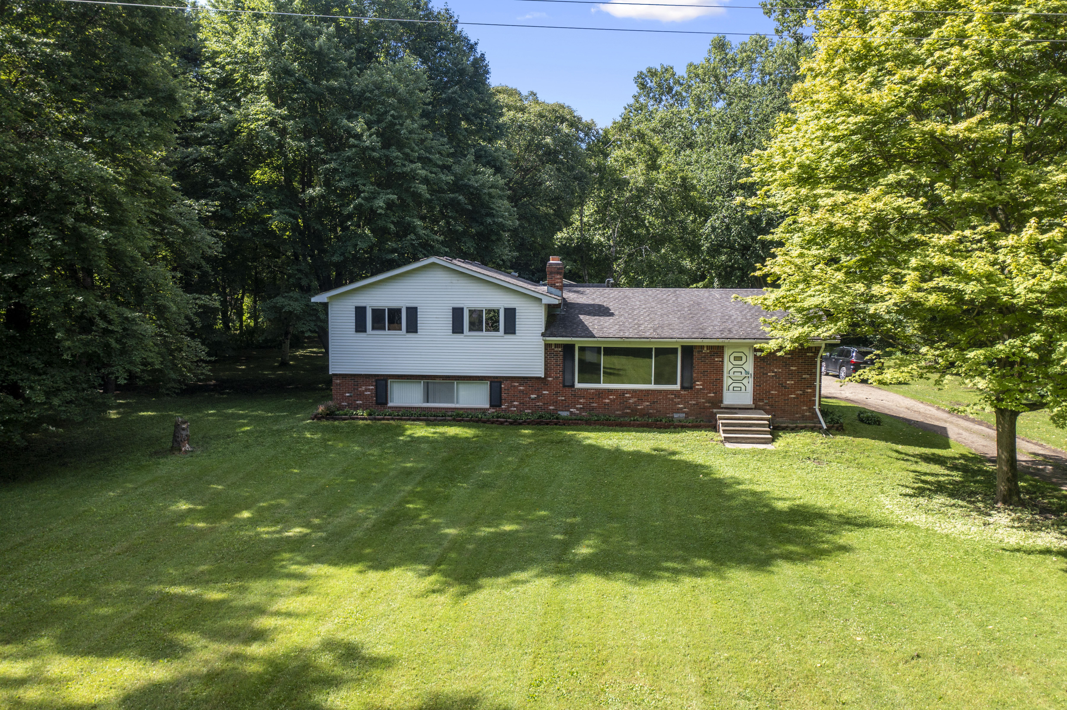 9246 Field Rd, Clay Twp, MI 48001 header image.