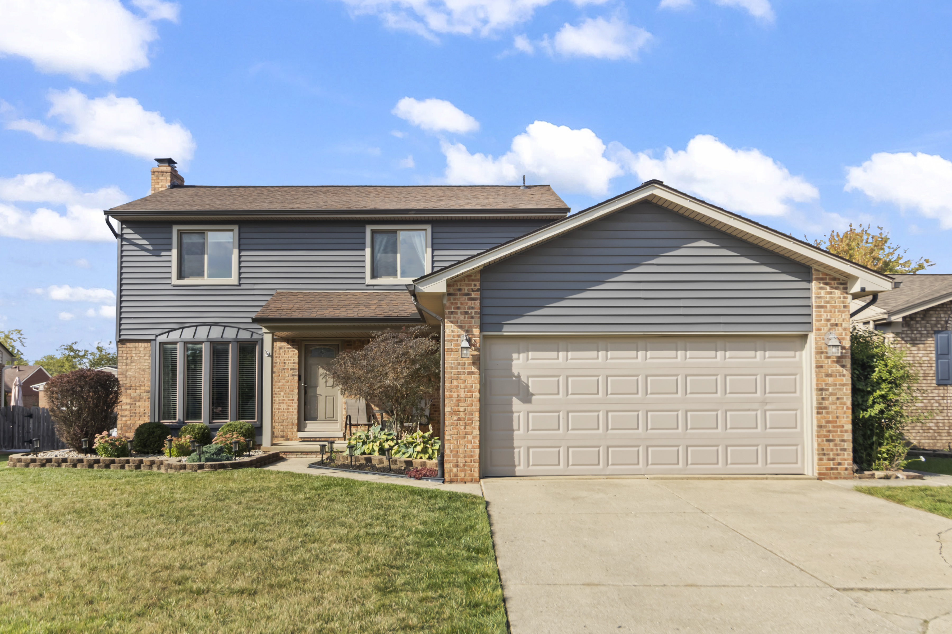 47212 Blossom Ln, Macomb, MI 48044 header image.