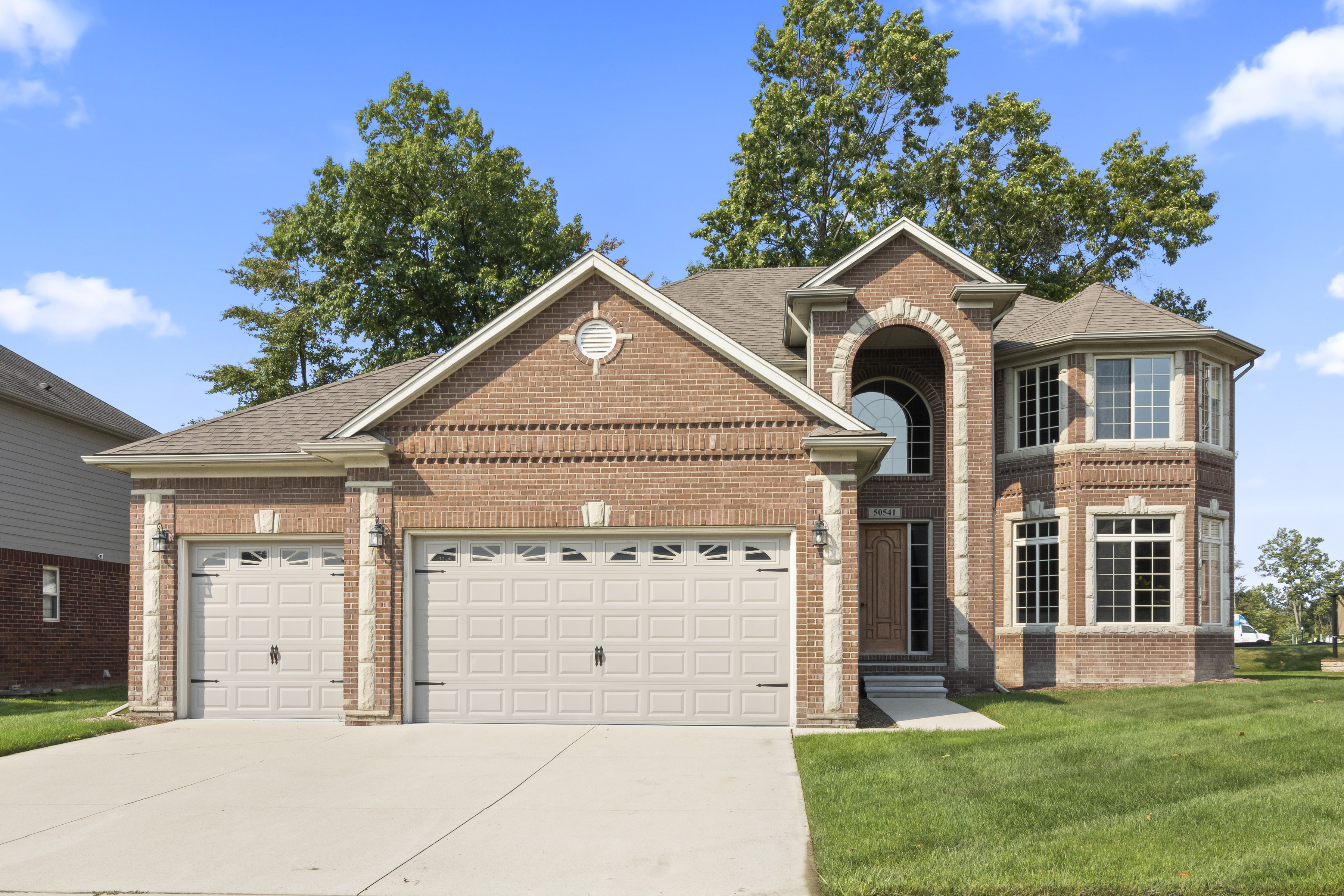 50541 Pinnacle Woods Ln, Macomb, MI 48042 header image.