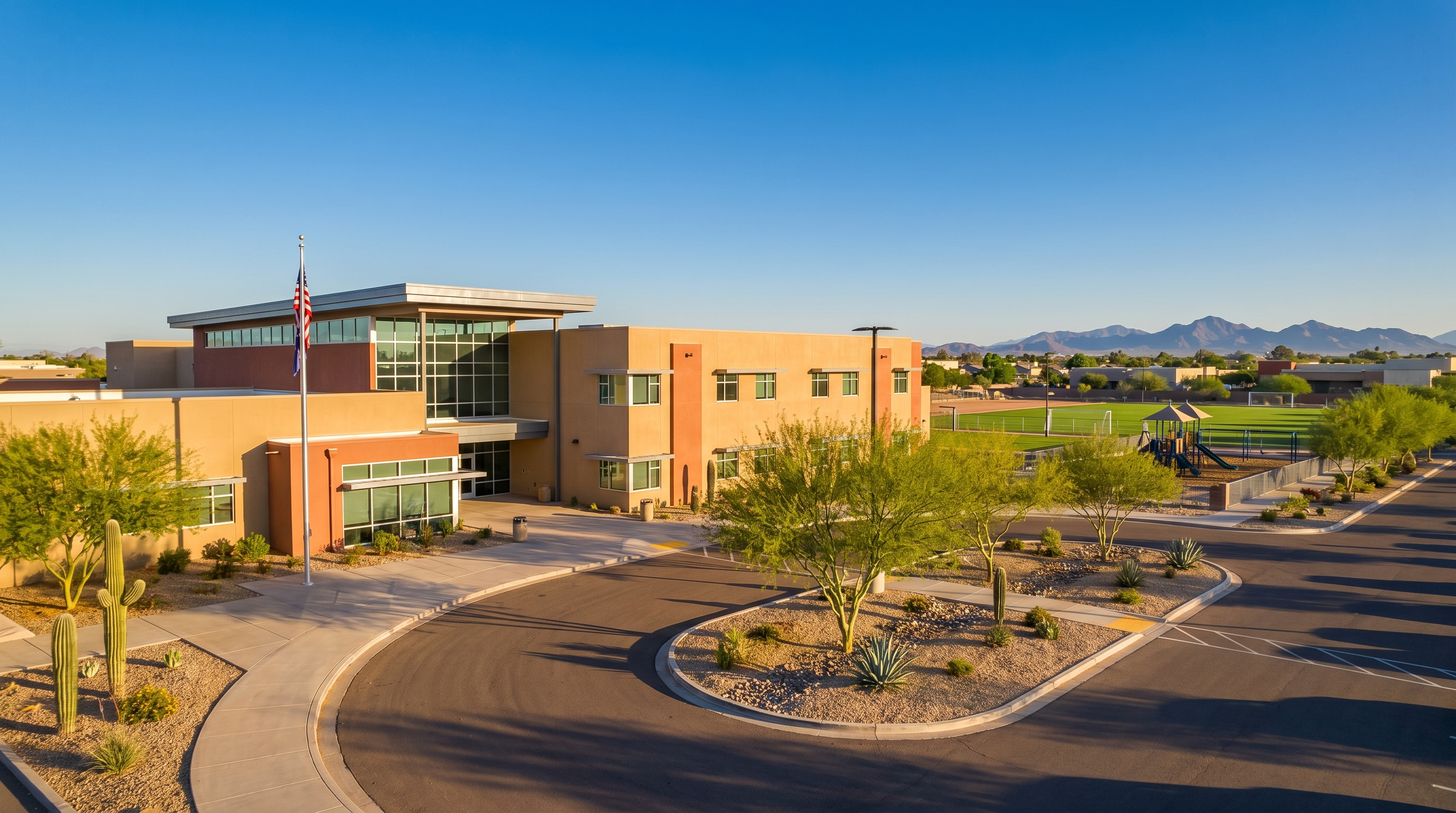Families walking near a highly rated public school in Gilbert, Arizona, with modern school building and desert landscaping in background
