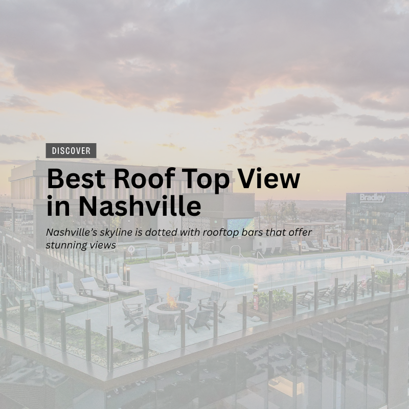 Group on Nashville rooftop at sunset with city skyline view.