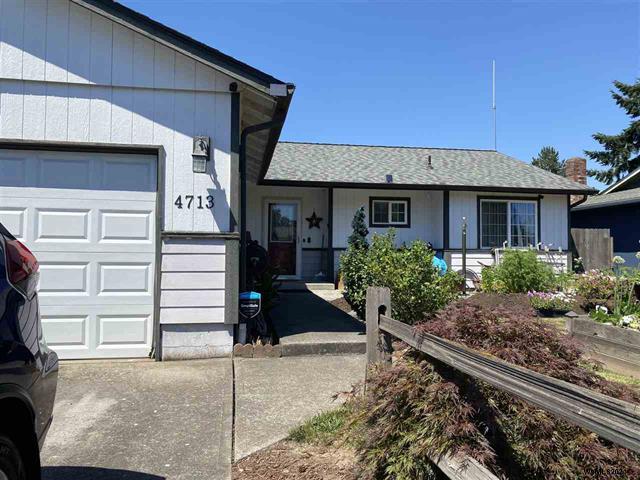 Nicely Updated Salem OR Home with a Unique Floor Plan! header image.