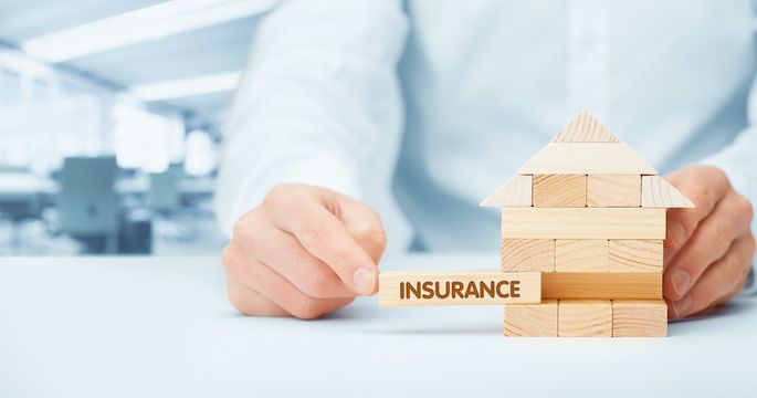 Is Home Insurance Required When You Buy a House? header image.