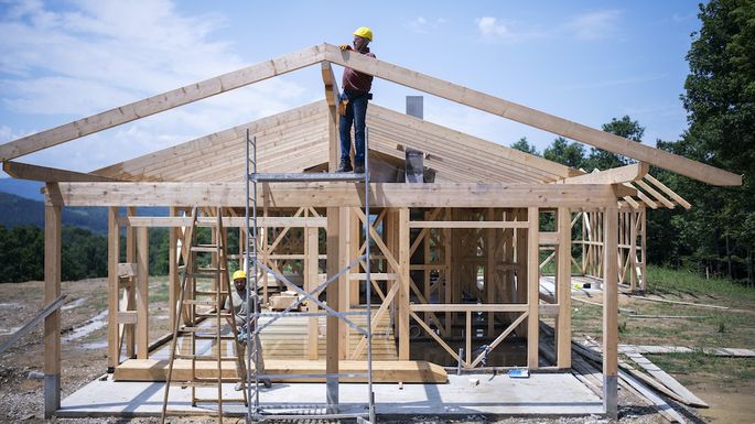 Want To Build Your Own House? The Pros, Cons, and Costs header image.