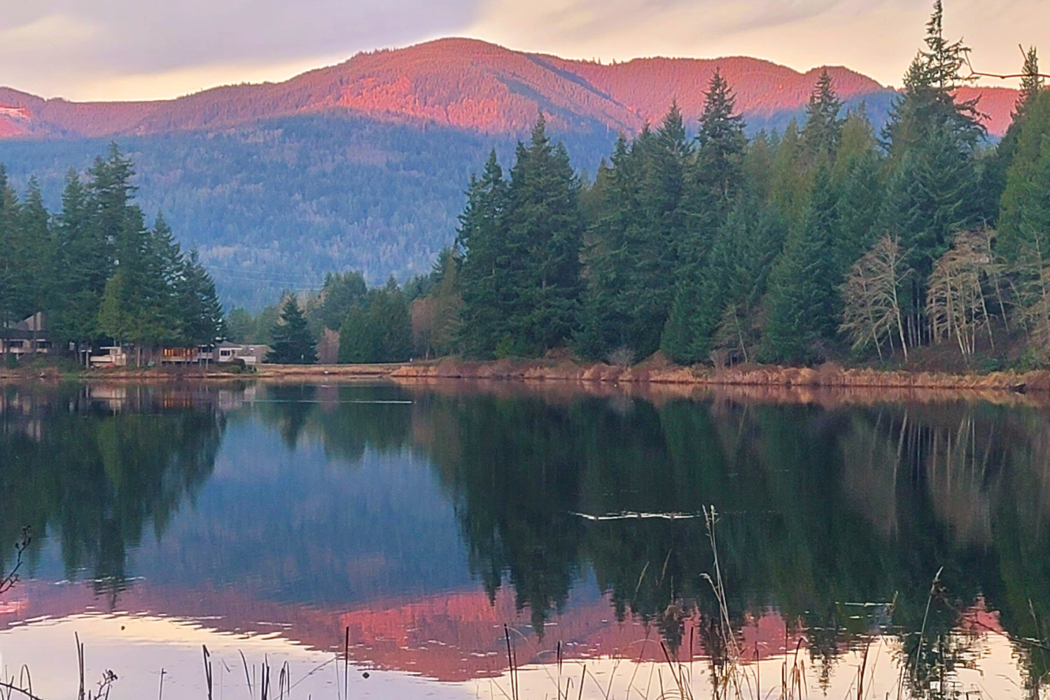 Beautiful sunset over the mountains and Lake Louise in Sudden Valley, WA