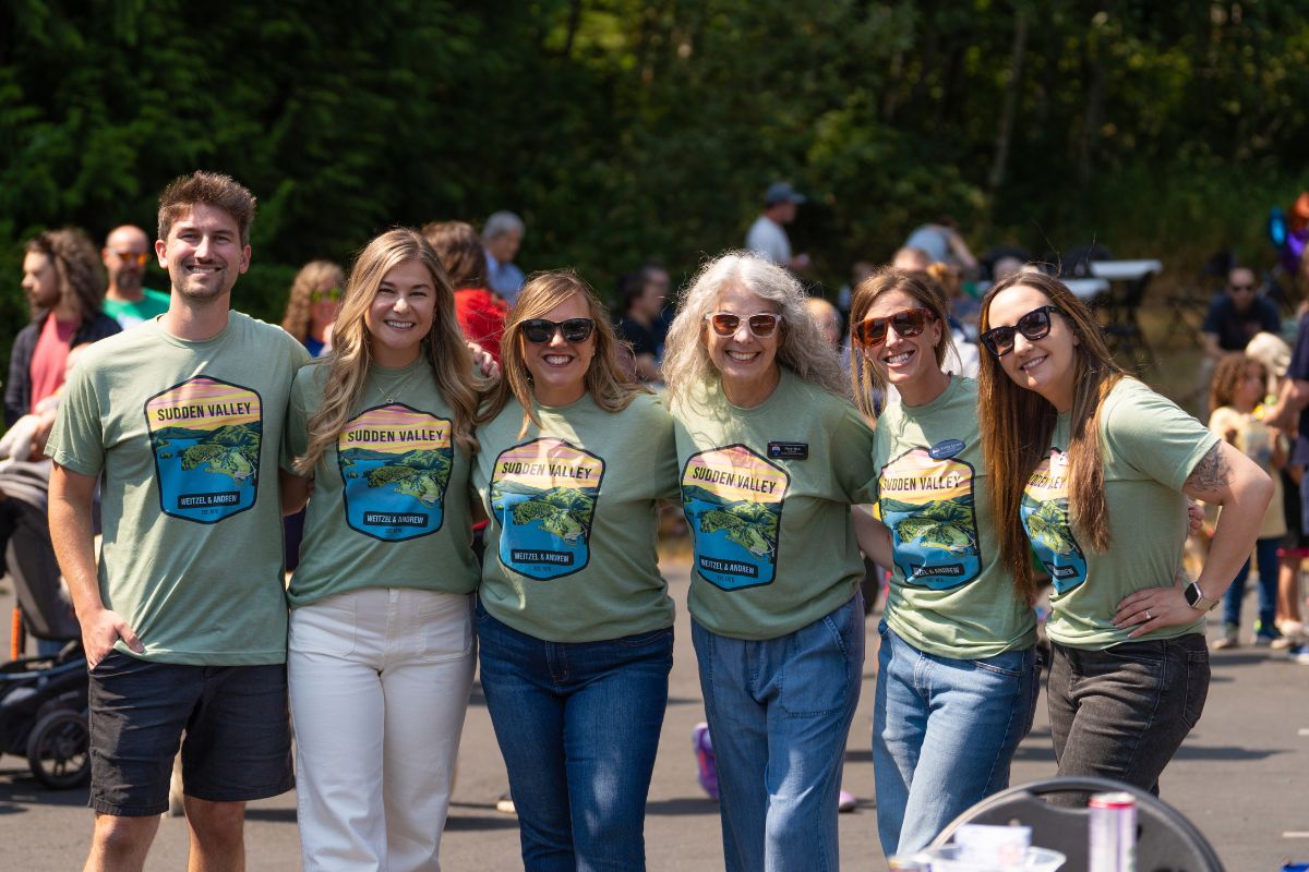 From left to right: Reilly (Marketing Manager), Sydney (Broker/Co-Owner), Carmen (Managing Broker/Co-Owner), Mary (Broker), Ashley (Broker/Listing Coordinator), Jessi (Broker)