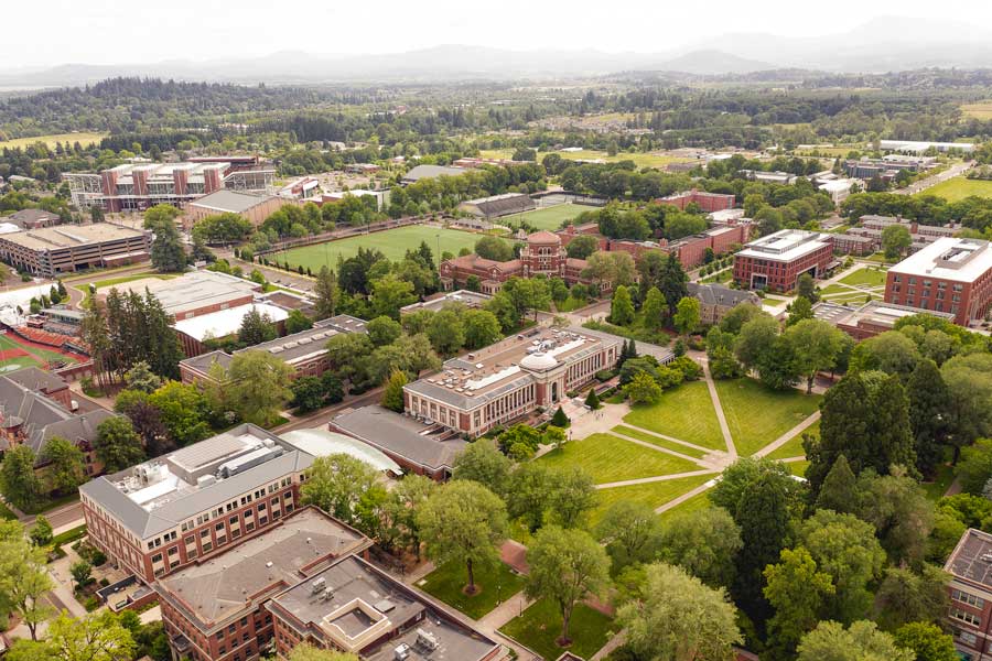 Oregon State University campus in Corvallis, Oregon featuring historic academic buildings, landscaped grounds, and a vibrant college atmosphere.