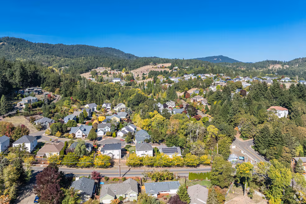 Aerial view of Northwest Corvallis, Oregon showcasing established neighborhoods, tree-lined streets, parks, and residential homes.