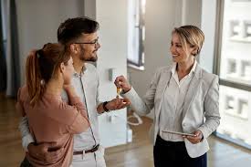 Real estate agent with clients