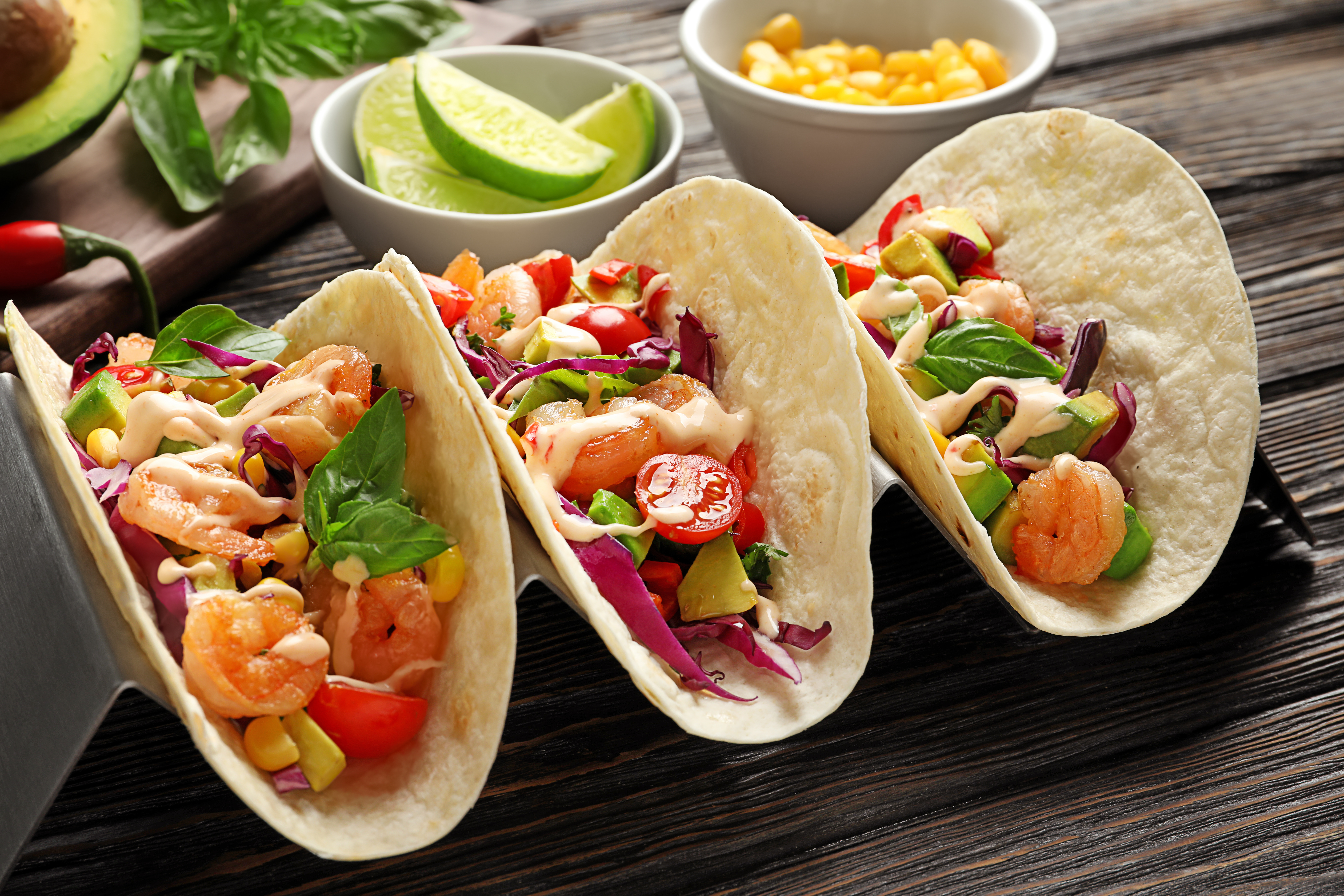 Shrimp tacos in a wooden taco holder, representing Grand Junction's growing restaurant scene