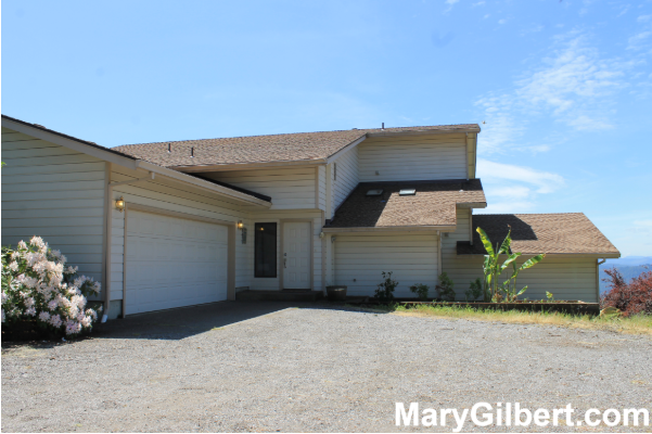 2461 Moorea Drive: Custom Built Home with Stunning Views! header image.