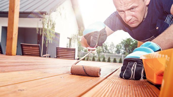 How to Stain a Deck: Your Summer Guide to Deck Maintenance Made Easy header image.
