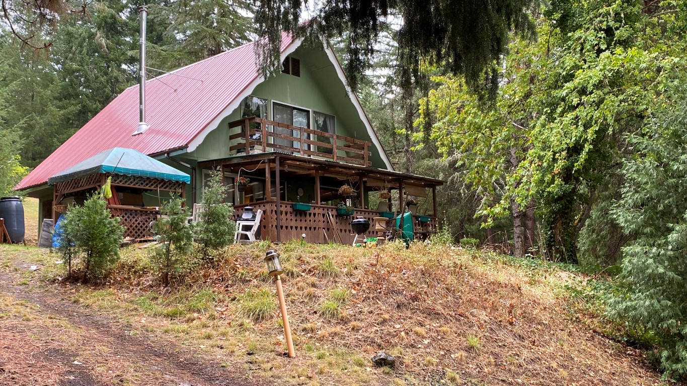 Unique Myrtle Creek OR A-Frame Tucked Away in the Woods! header image.