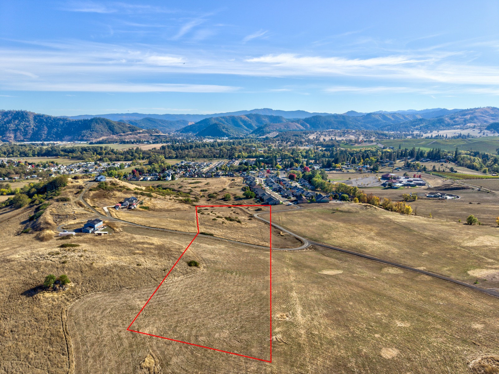 Aerial view of the Wil Way tax lot 200 parcel and surrounding Winston landscape; outline is approximate