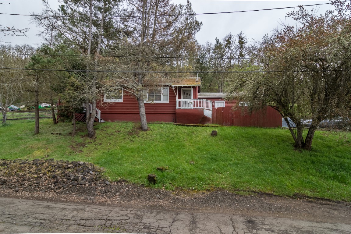 1407 SE Marsters Ave: Cozy Log Cabin in Convenient Location! header image.