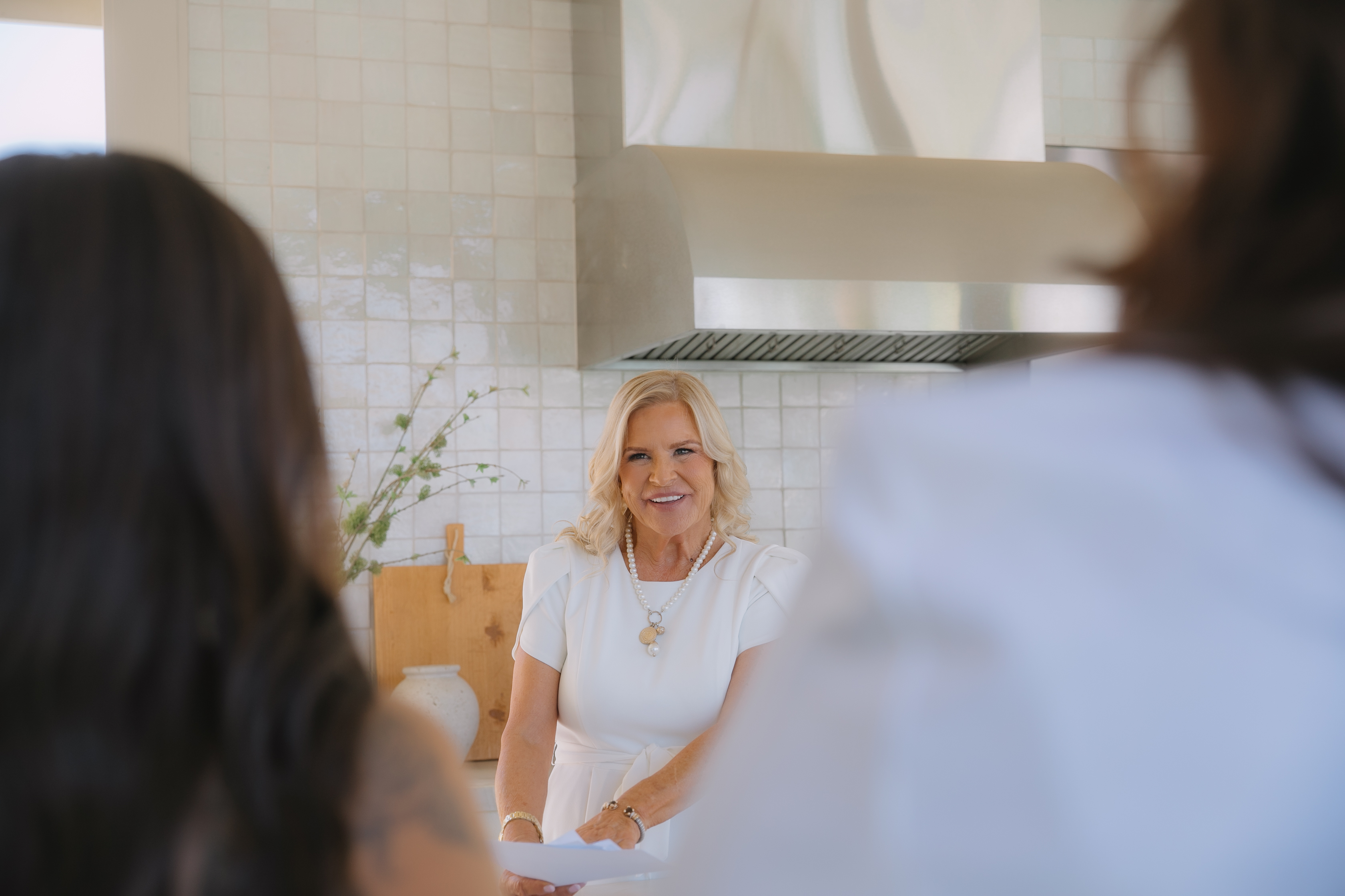 Laurie McCarty showing a home to buyers