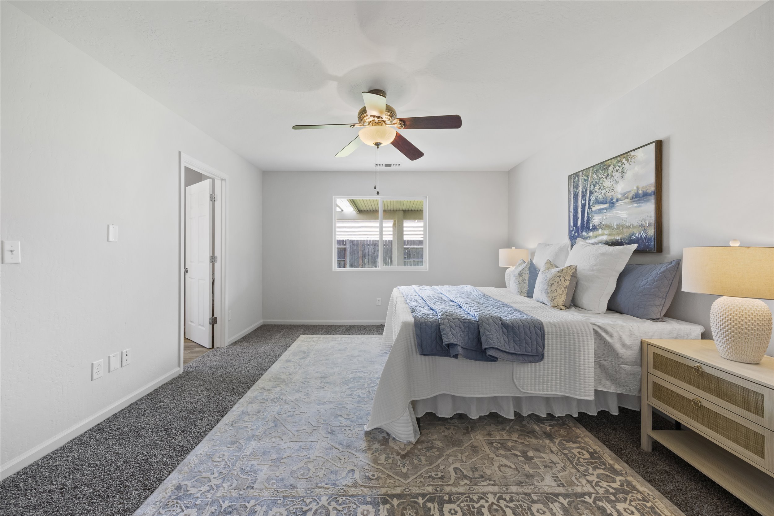 Staged primary bedroom in a Bakersfield home for sale