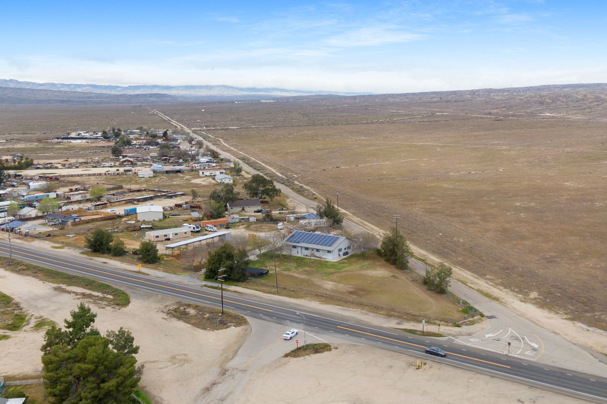 Aerial shot of residential home in Taft with horse property