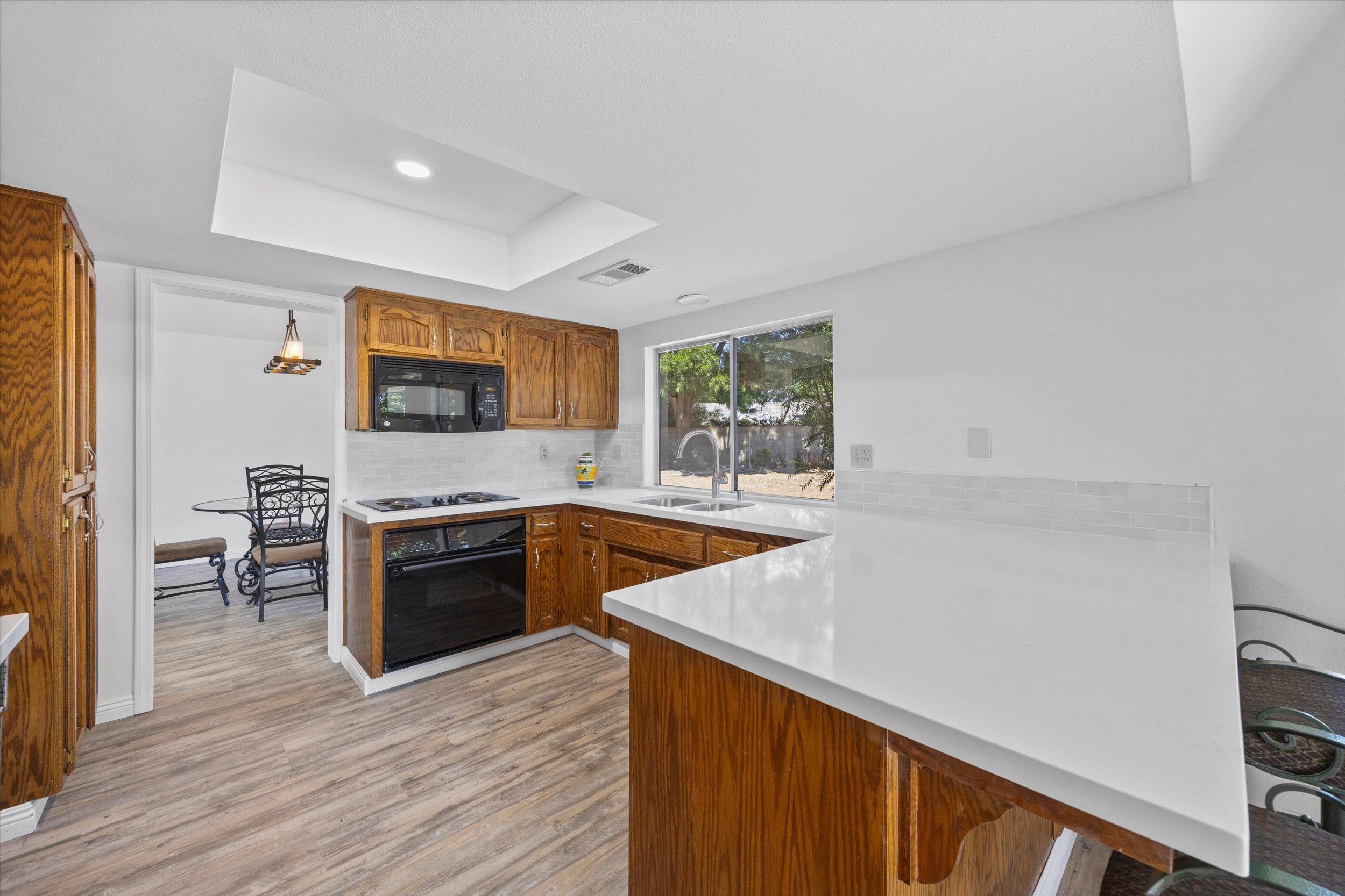 Kitchen with white countertops