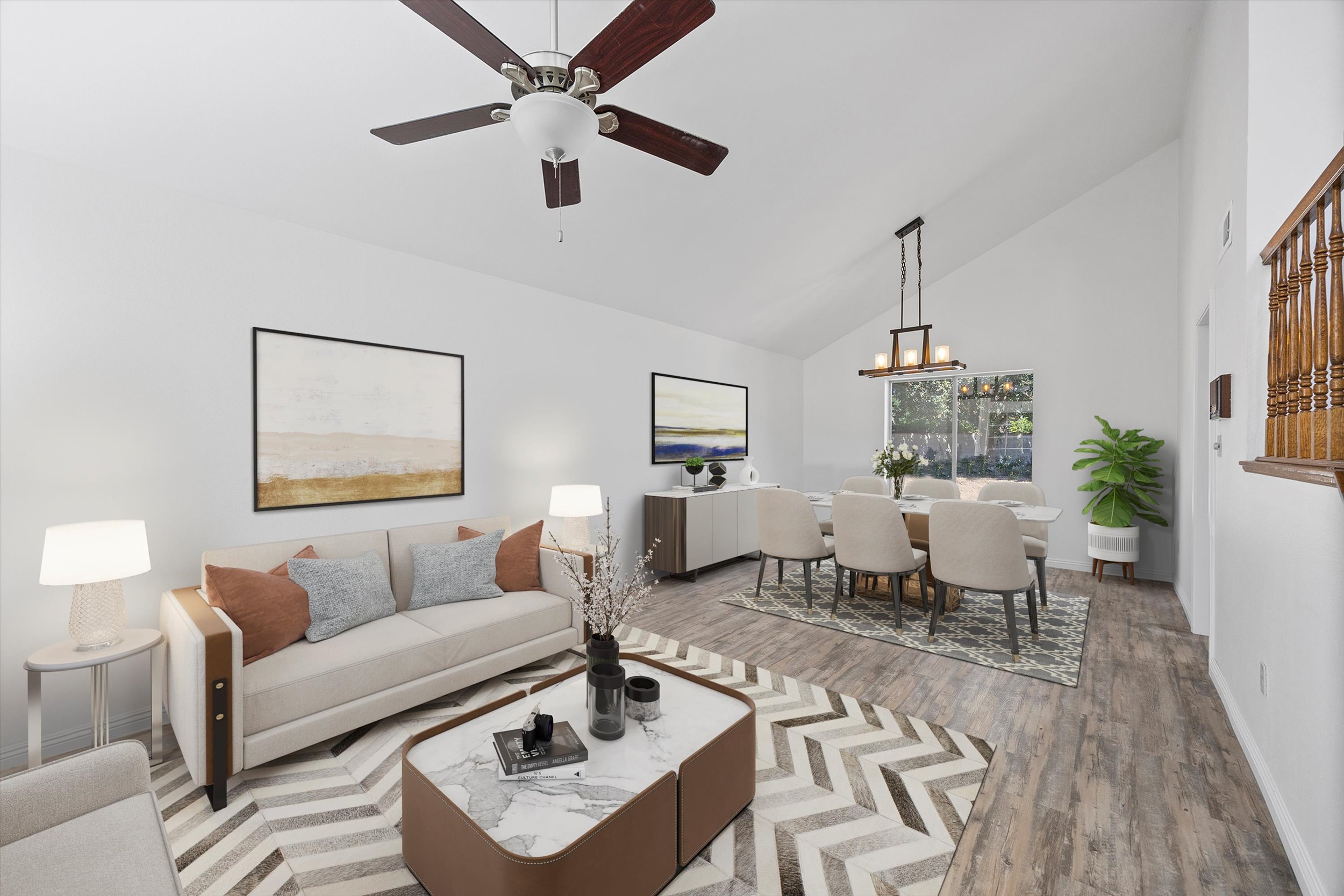 Formal living room and dining room decorated in neutral tones with on trend furniture