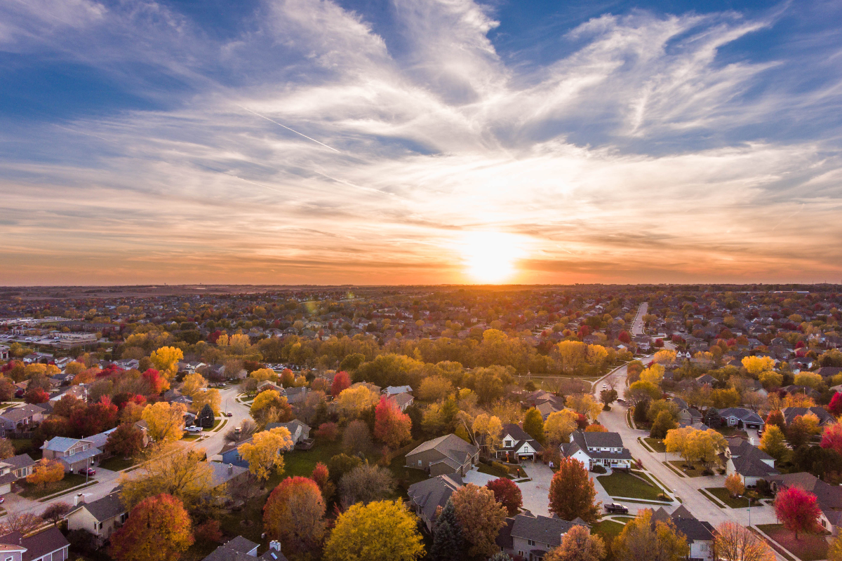 Utah neighborhood at sunset, symbolizing real estate market outlook amid steady interest rates