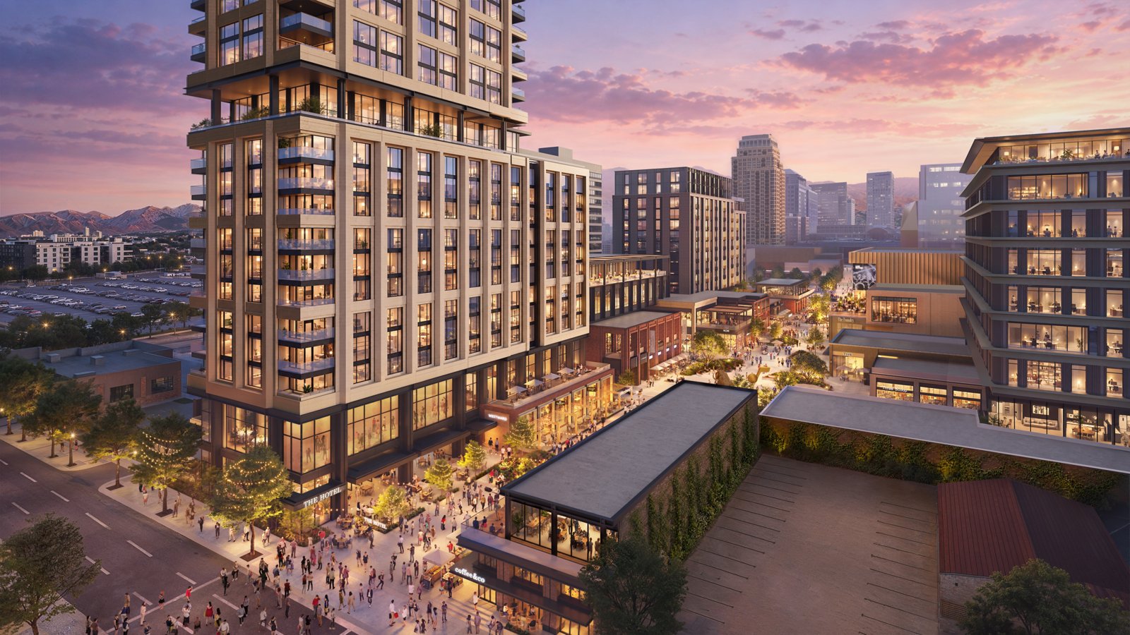 Aerial rendering at dusk of the planned Salt Lake City entertainment district, showing a residential tower above a busy pedestrian plaza