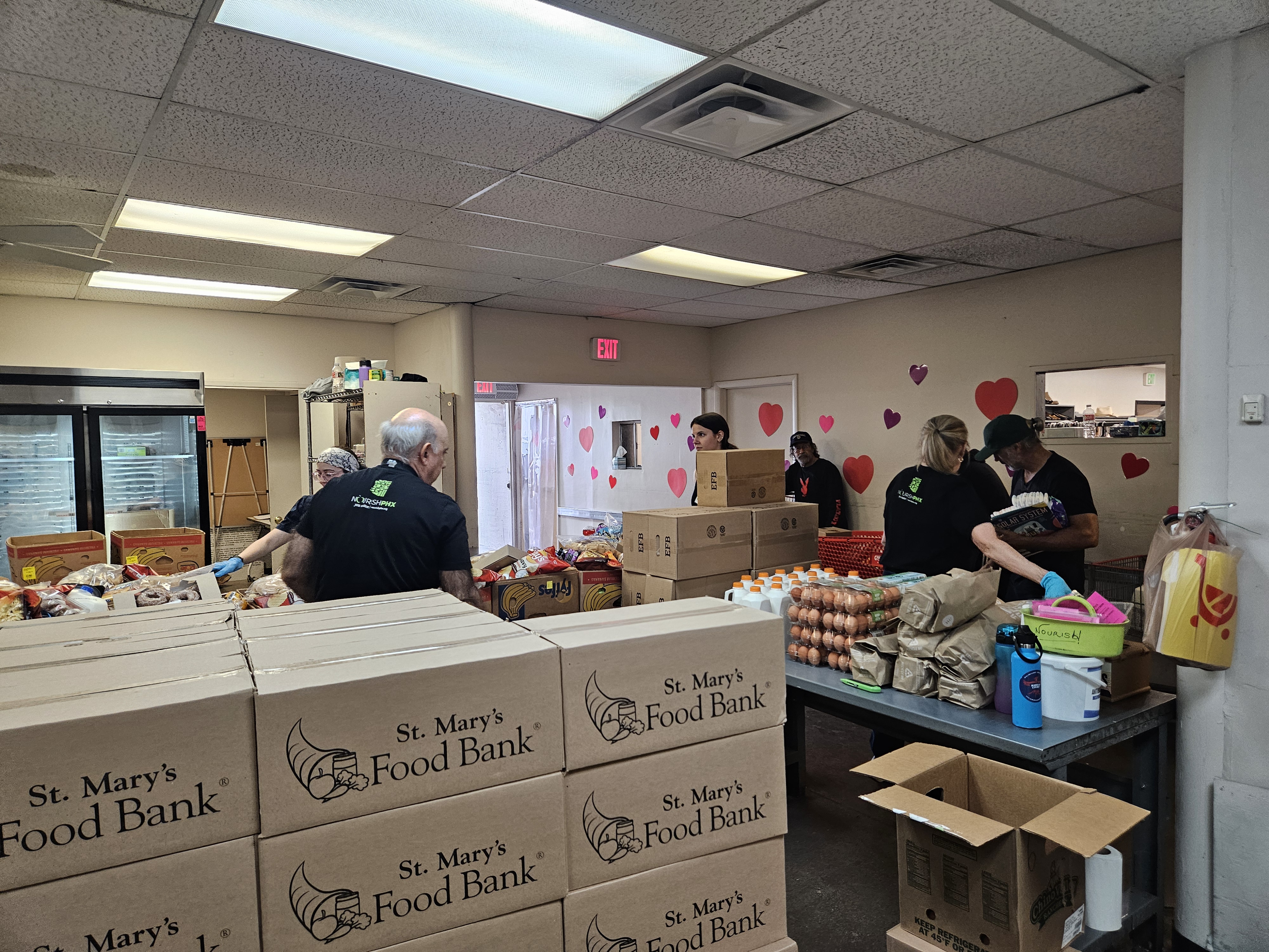 Alan Davis of HomeBright Realty supporting Arizona charities on Valentine’s Day 2026, spreading love beyond chocolates.