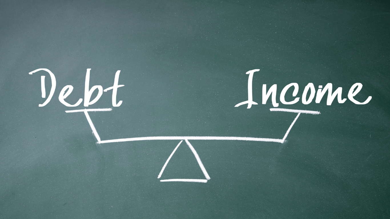 Debt to income balance concept illustrated on a chalkboard — showing the relationship between debt and income, representing the importance of maintaining a healthy debt-to-income ratio for mortgage and real estate loan approval.