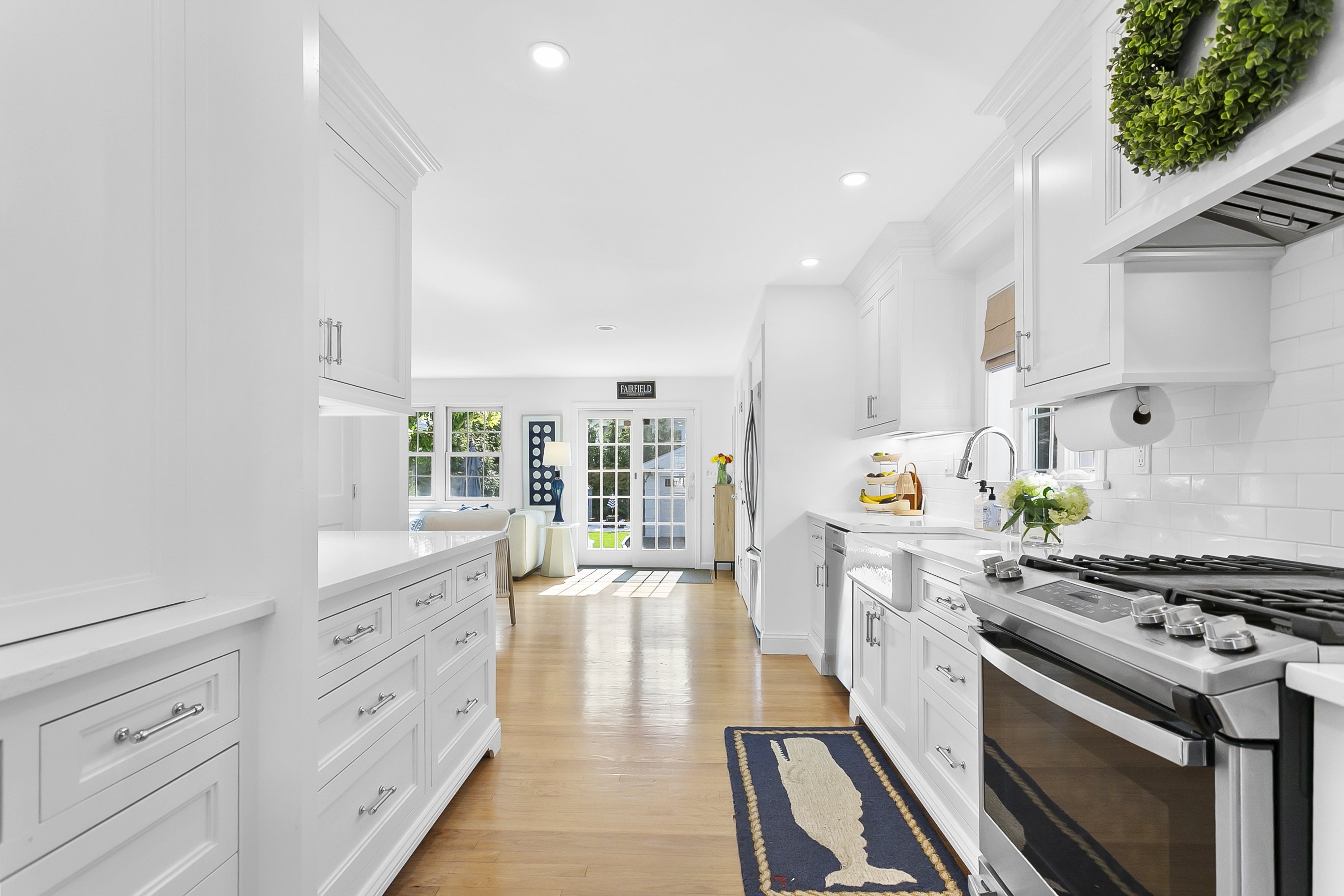 White Cape-style home with dark shutters at 162 Eastlawn Street, Fairfield CT, now under contract