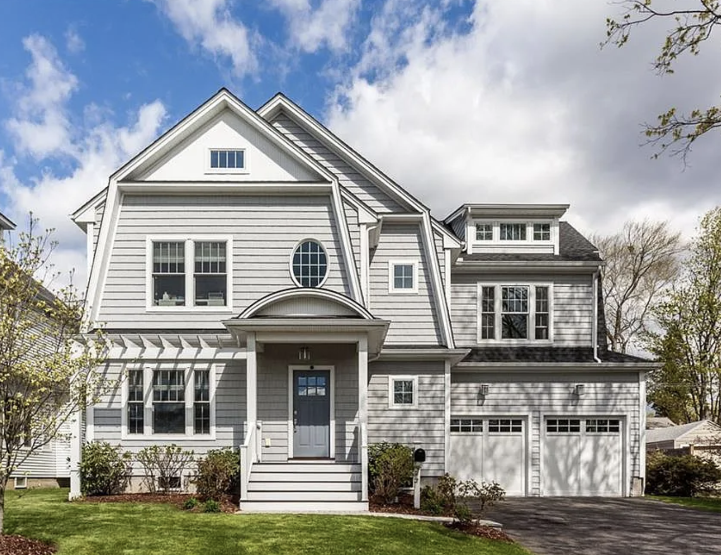 Gray Nantucket-style coastal home at 824 Riverside Drive, Fairfield CT