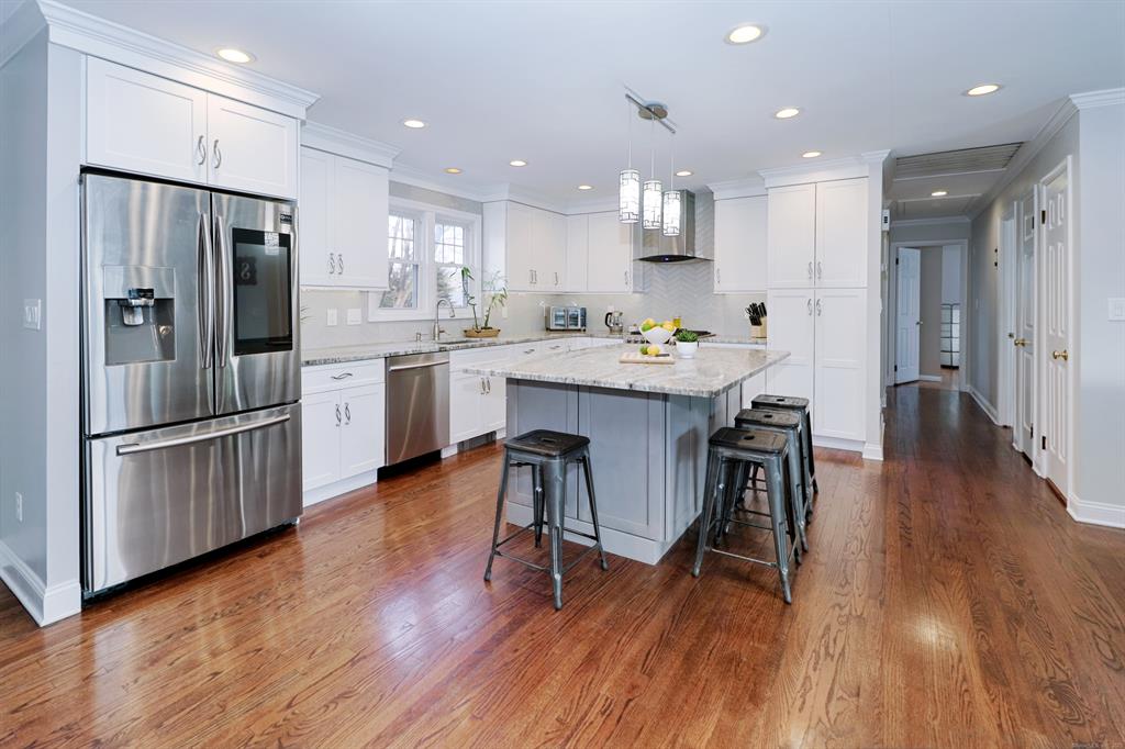 Ranch-style home with tan siding at 471 Edison Street, Trumbull CT, recently sold
