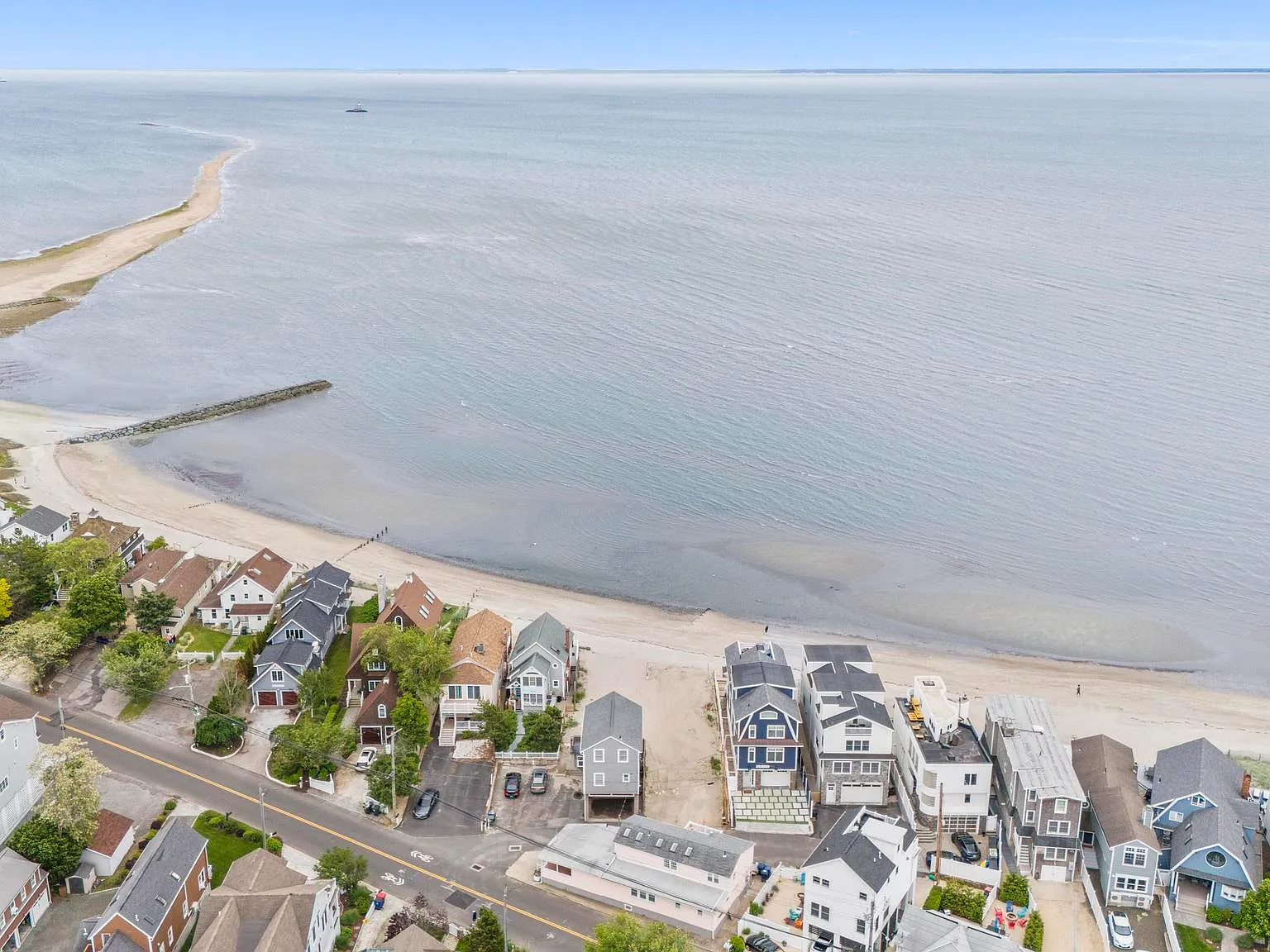 Aerial view of the Fairfield CT shoreline with beachfront homes along Long Island Sound