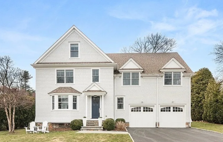 19 Thomasina Lane in Darien CT, a luxury in-town home on a quiet cul-de-sac with a large flat backyard and flagstone terrace.