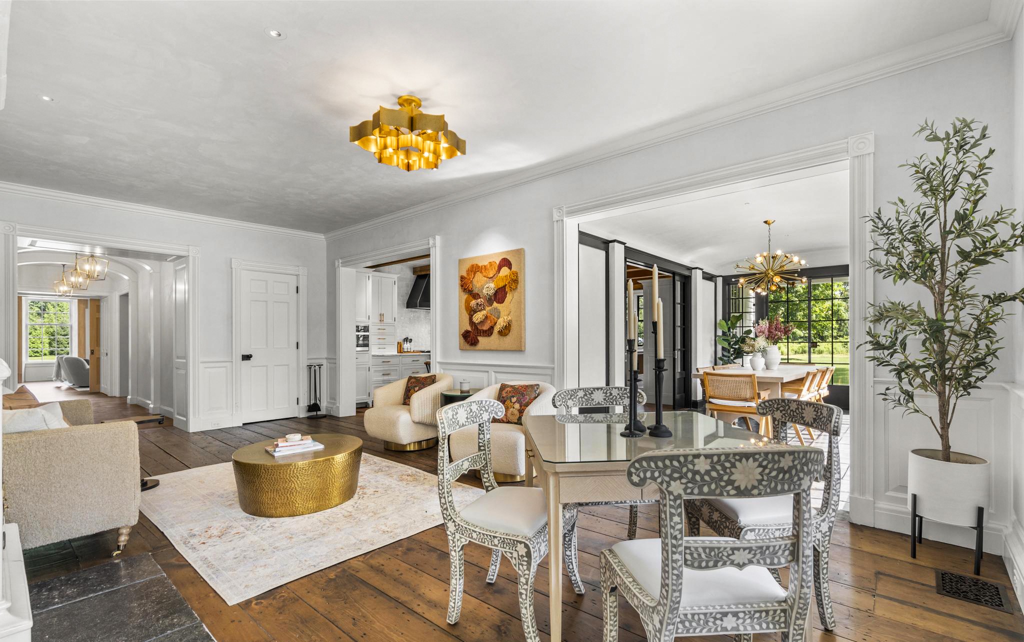 Light-filled living space opening to the patio and grounds at 98 Banks Place, Southport CT