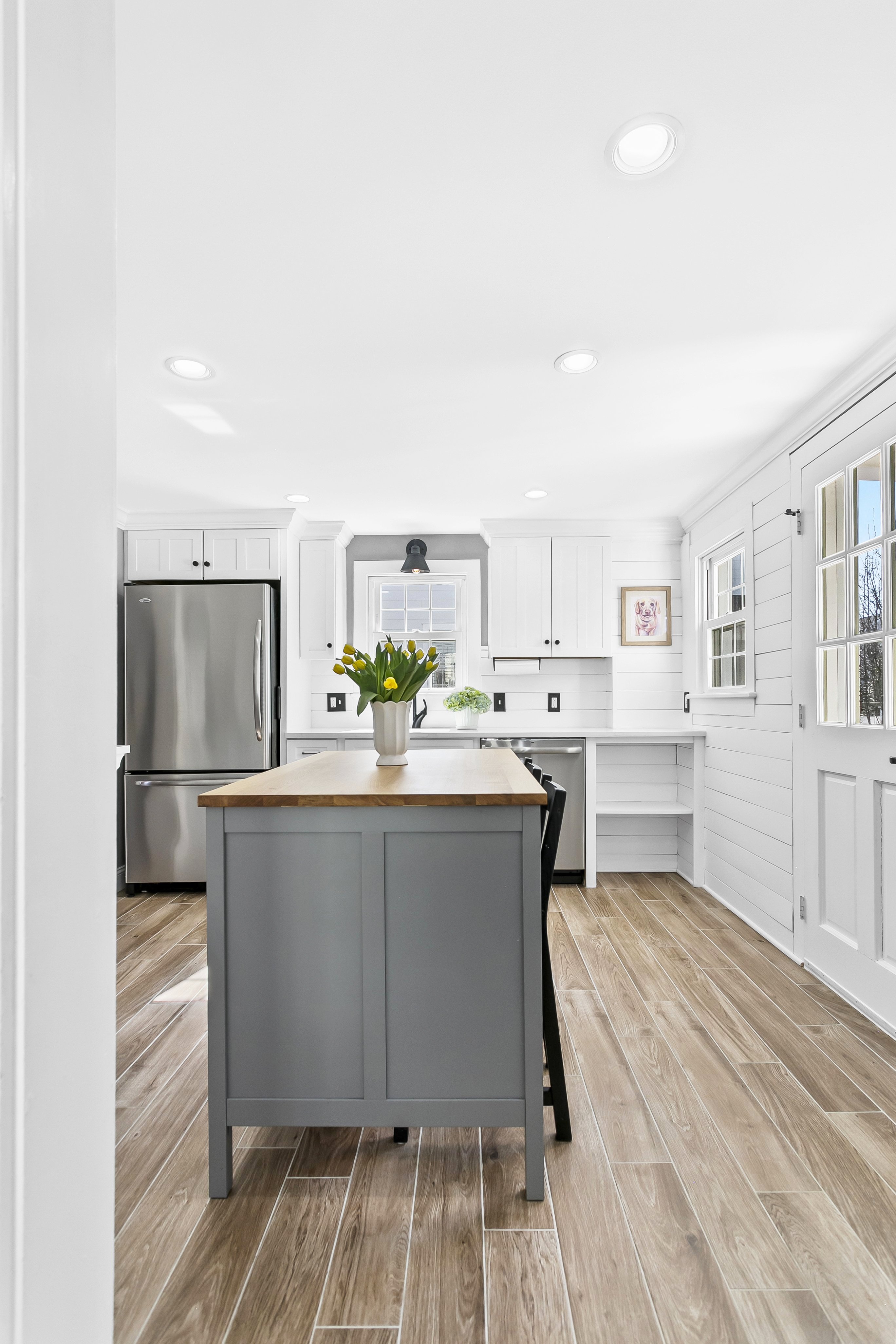 White colonial home with black shutters at 58 Smith Street, Fairfield CT, now under contract