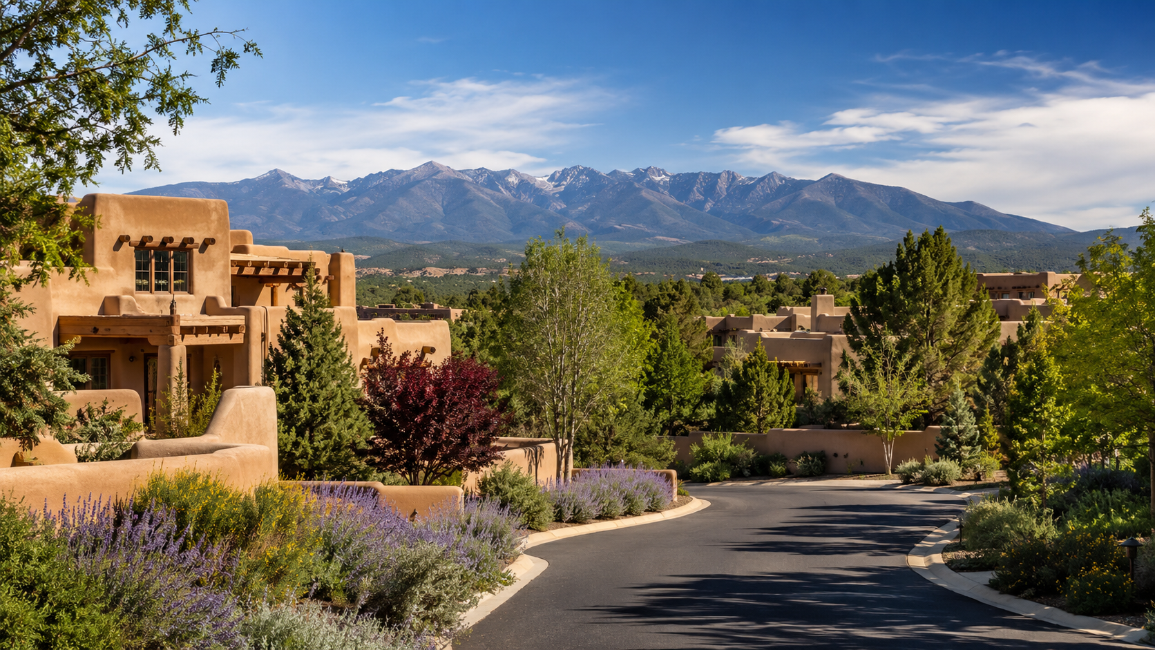 Santa Fe New Mexico neighborhood with adobe homes and mountain views