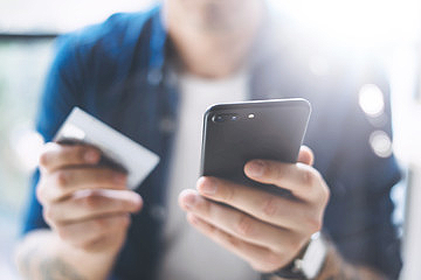 Credit Score Boost? Cellphone, Utility Payments Soon to Get Factored In header image.