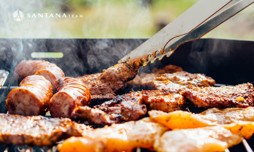 Grilled food on a barbecue with summer sides, celebrating Labor Day in Greater Boston.