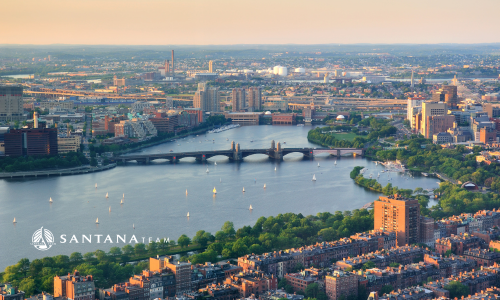 Aerial view of Greater Boston with the Longfellow Bridge crossing the Charles River and Back Bay skyline in view.