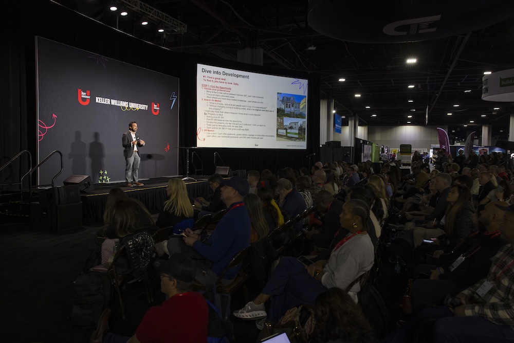 Audience attending Hudson Santana presentation at KW Family Reunion event
