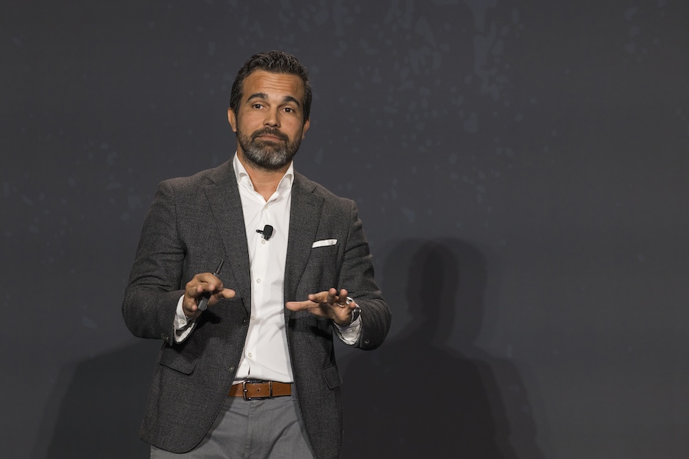 Hudson Santana speaking on stage at Keller Williams Family Reunion 2026 in Atlanta