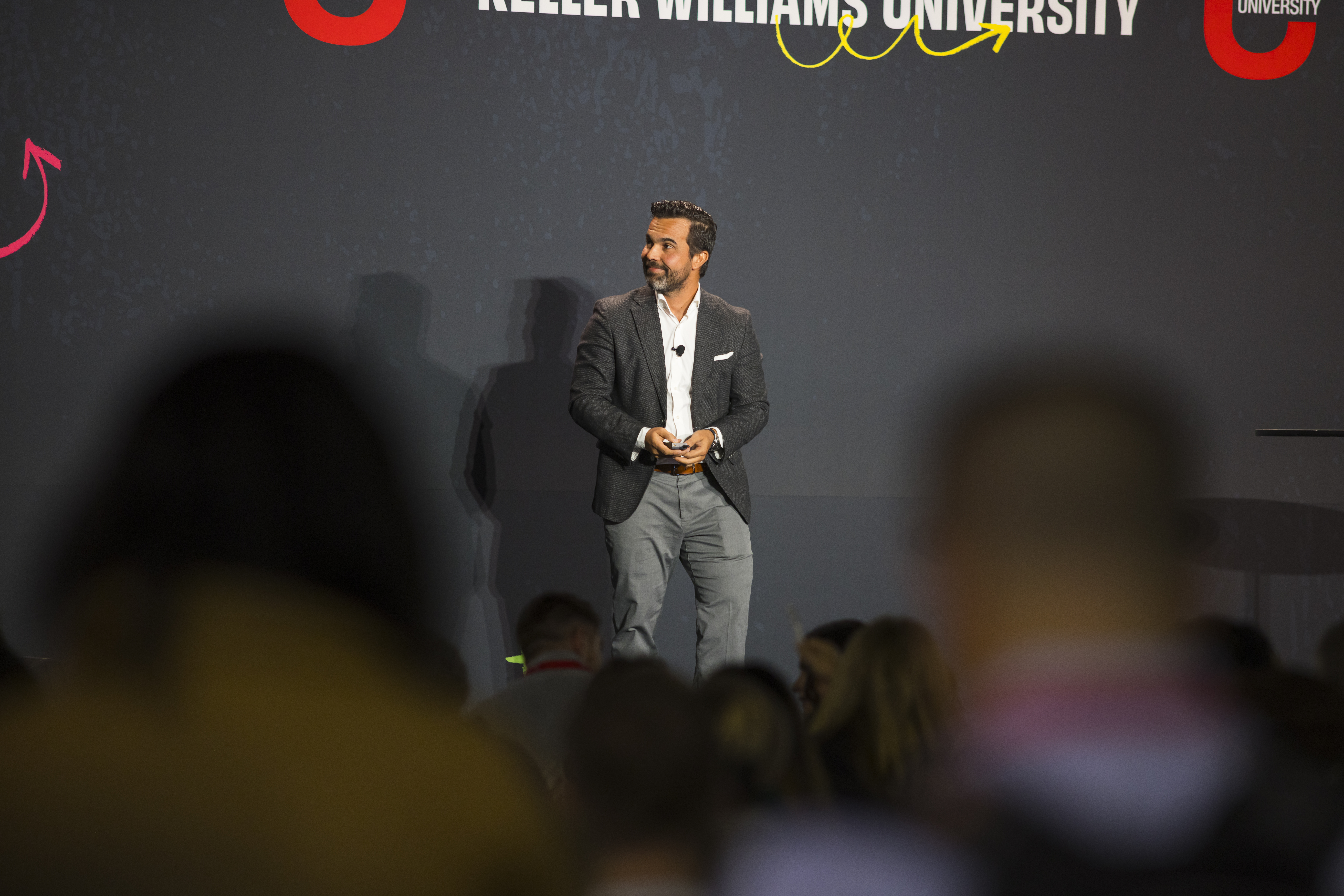 Hudson Santana speaking on stage at Keller Williams Family Reunion 2026 in Atlanta