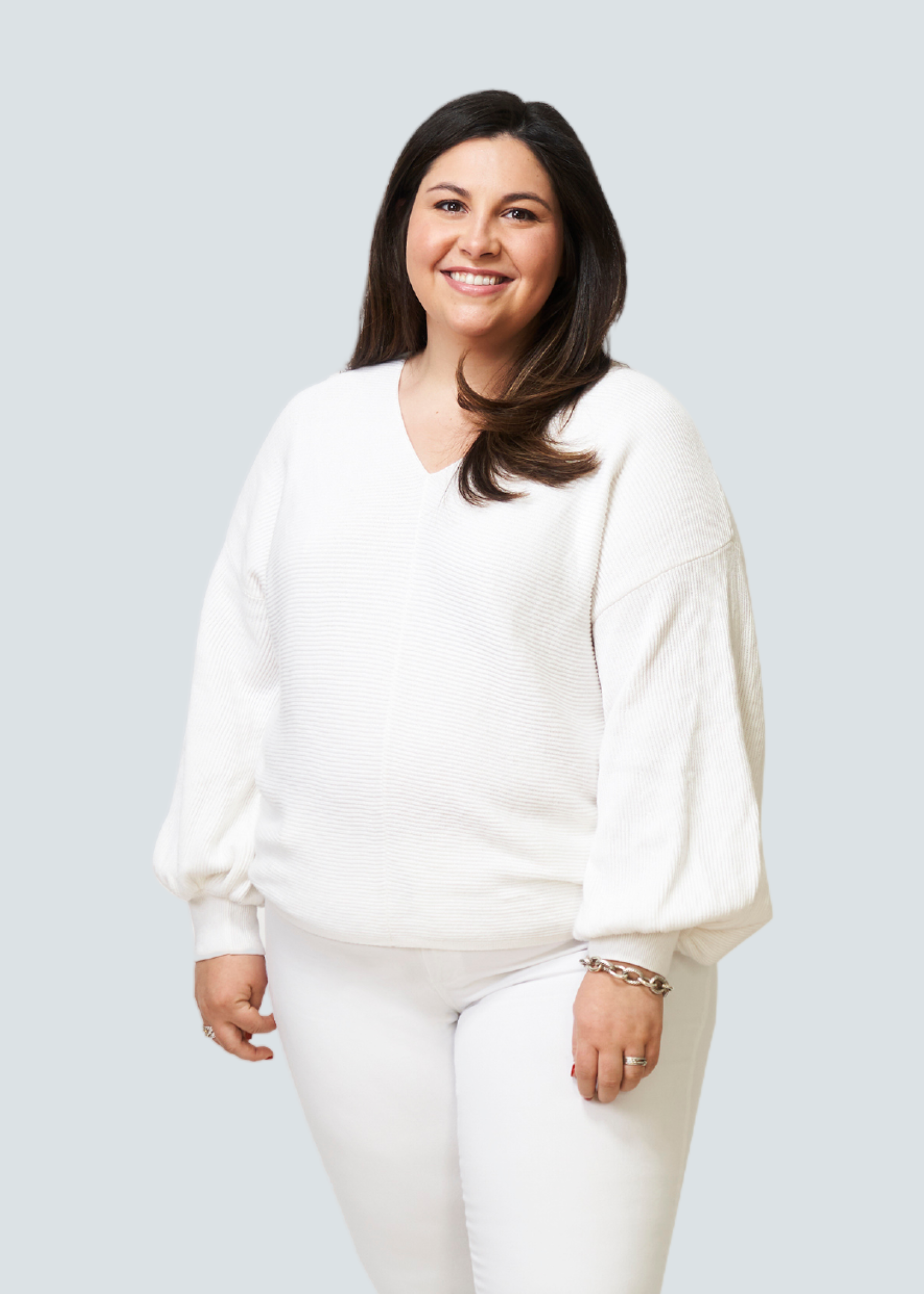 Liz, Santana Team staging and listing coordinator, smiling in studio portrait