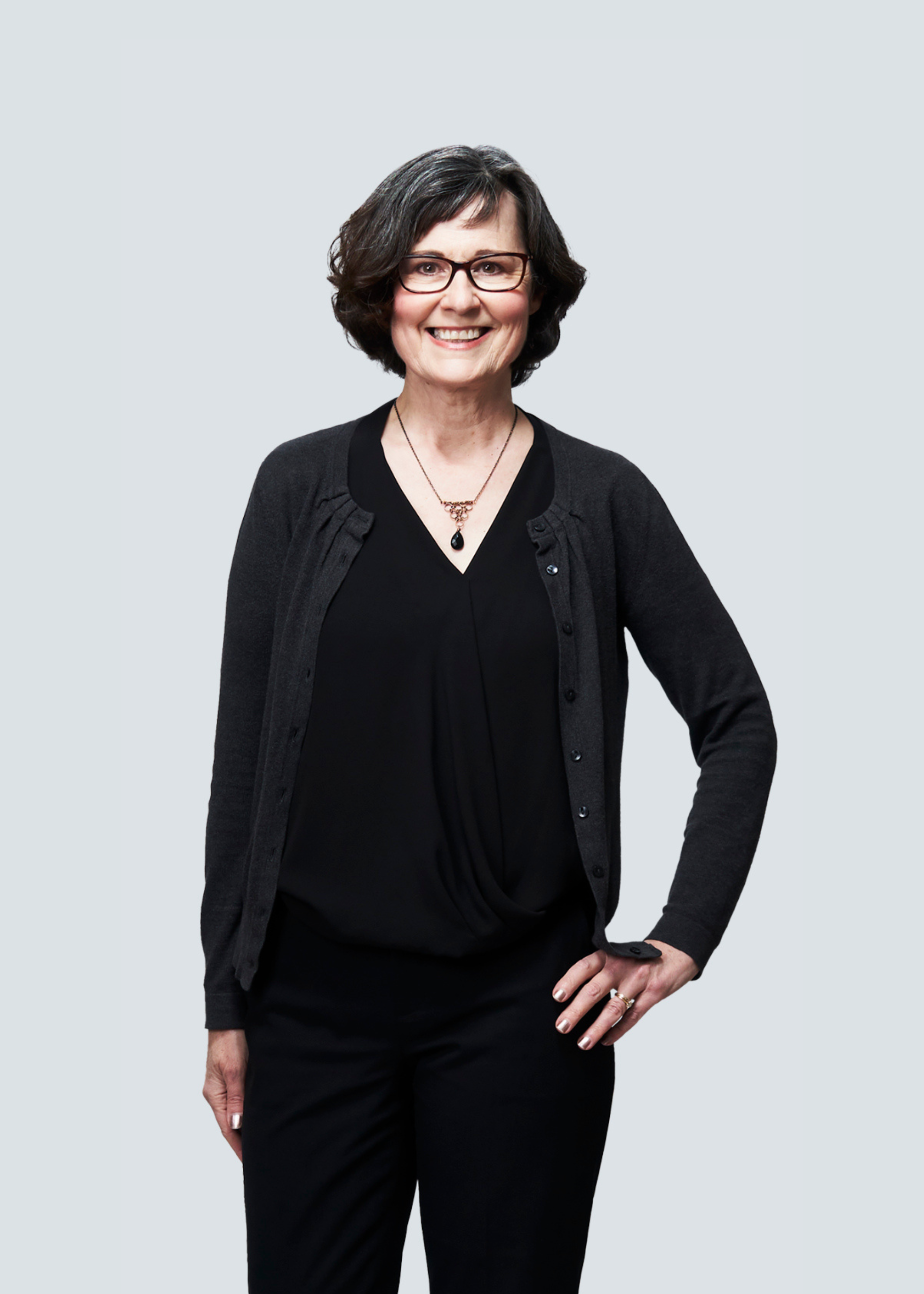 Terry, Santana Team transaction support, smiling in studio portrait