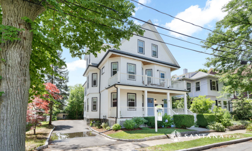 East Arlington condo conversion with two luxury townhomes, originally a multi-family home.